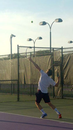 RAF Tennis player serves